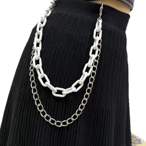 Double layer waist chain detail, white plastic and silver metal links for trendy style.