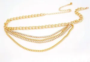 Detailed view of the multi-layer gold rhinestone waist chain, exquisite metal design.
