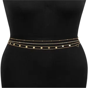 Gold multi-layer waist chain body jewelry, featuring delicate coin charms and heart detail.
