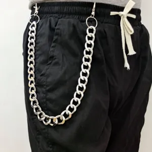 Punk metal pants chain detail shot, silver heavy hip hop trouser chain for women and men styling.
