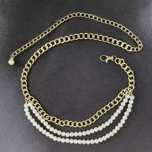 Detailed shot of the multi-layer gold chain and faux pearl waist body jewelry design.