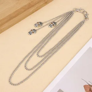 Punk style multi-layer metal pants chain with skull pendants for streetwear.