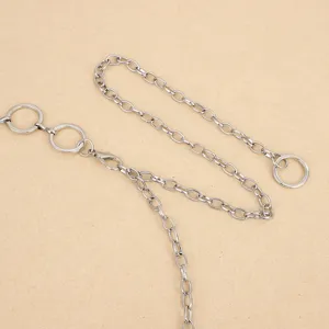 Punk style metal waist chain detail shot, silver ring pants chain accessory for women hip-hop decor.