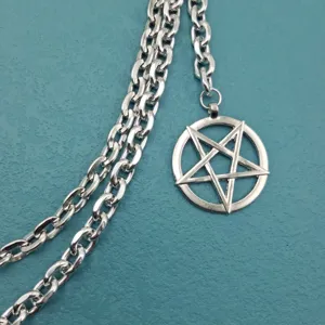 Punk silver-tone metal waist chain with pentagram pendant for hip hop streetwear fashion.