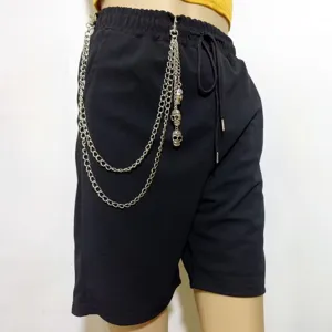 Punk style black shorts featuring retro multi-layer metal chain with skull charms.