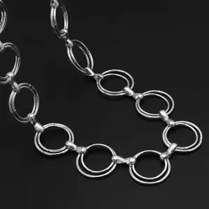 Silver metal waist chain detail, stylish double ring design for women fashion accessories.