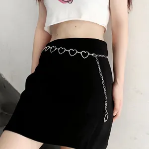 Detail shot of a trendy silver heart metal waist chain, perfect for cool hip-hop streetwear styles.