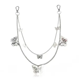 Close-up detail of the multi-layer silver butterfly body waist chain featuring hollow charms.