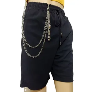 Gothic punk multi-layer metal chain shorts with skull pendants for edgy fashion styles.