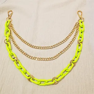Multi-layer punk style chain detail, neon green resin and gold metal link design for bags or pants.