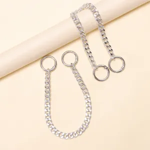 Silver metal shoe chain accessory with round rings, perfect for stylish footwear decoration.