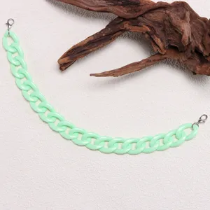 Close-up of mint green chunky plastic chain accessory with metal clasps for daily use