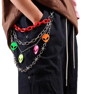 Punk style pants chain with colorful plastic and metal chains, alien pendant for street wear.