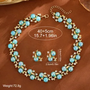 Ensemble de bijoux collier et boucles d'oreilles perles bleues rétro bohème et strass.