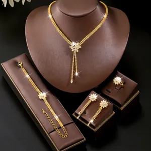 Elegant gold zircon necklace earrings bracelet ring four-piece jewelry set for women.