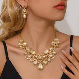 Luxuriöses goldfarbenes Kristall Strass Halskette und Ohrringe Set, ideal für Braut und Party.