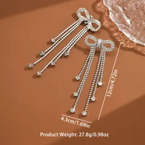 Eleganti orecchini con fiocco in strass e nappe, lunghi pendenti di cristallo donna.