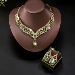 Exquisite green teardrop rhinestone necklace and earrings set, perfect for bridal wedding evening wear.