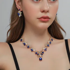 Elegante set di gioielli da sposa con collana orecchini strass cristallo blu dorato.