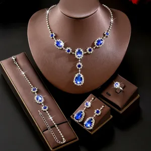 Splendido set di gioielli in cristallo blu con collana bracciale orecchini e anello eleganti.