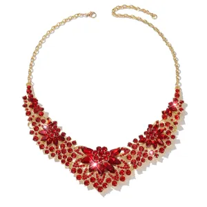 Exquisite gold-tone red rhinestone flower necklace detail view, dazzling crystal bib design.