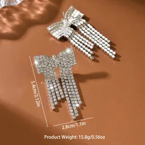 Glänzende Strass Schleife Quaste Ohrringe für Damen, elegante Kristall hängende Modeschmuck.