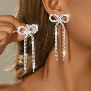 Eleganti orecchini lunghi con fiocco in strass da donna, gioielli scintillanti in cristallo.
