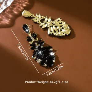 Boucles d'oreilles longues feuille cristal noir luxe femme, bijoux mode audacieux.
