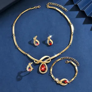 Set di gioielli alla moda in lega dorata collana orecchini anello bracciale con strass rossi