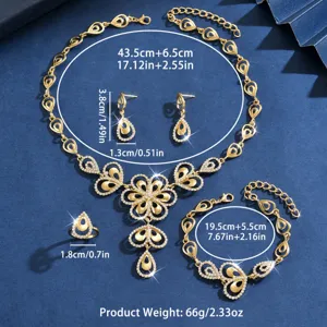 Vista detallada del juego de joyas florales de cristal dorado con collar, aretes, anillo y pulsera.
