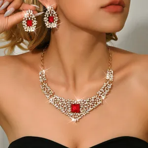 Vintage luxury gold red crystal necklace earrings set detail, elegant bridal jewelry closeup
