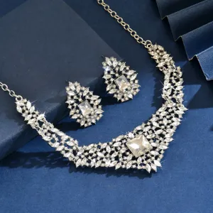 Stunning rhinestone crystal necklace and earrings set featuring luxury vintage leaf bridal design.