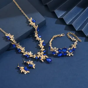 Set di gioielli da sposa con collana, bracciale e orecchini di cristallo blu dorato.