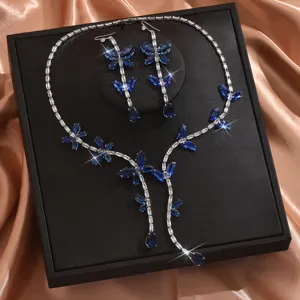 Elegante set di gioielli con collana e orecchini a farfalla in cristallo blu per matrimoni
