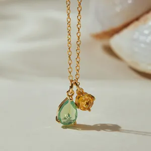 Minimalist 18K gold plated copper o-chain necklace featuring teardrop and round gemstone pendants.