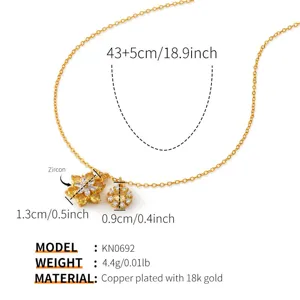 Detailed view of 18k gold plated copper necklace with colorful zircon flower pendants.
