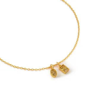 Delicate gold chain necklace featuring oval and rectangular gemstone pendants for elegant daily wear.