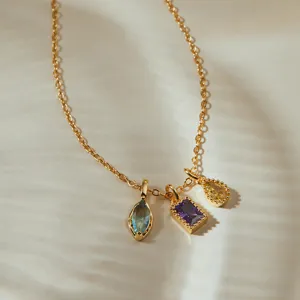 Elegant gold-tone chain necklace featuring multi-color cubic zirconia charms, daily wear.
