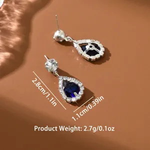 Elegantes pendientes colgantes de lágrima de circonita azul con halo brillante 2.8x1.1cm