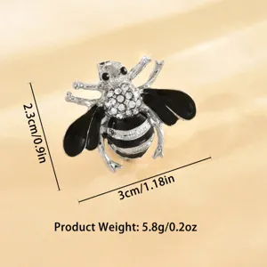 Spilla ape in strass argento con smalto nero, elegante accessorio per abbigliamento insetto.