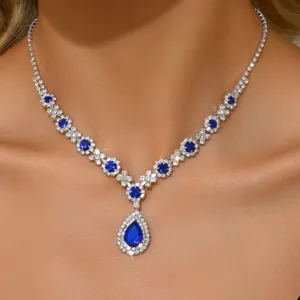 Detailed close-up view of elegant silver crystal water-drop pendant necklace for women.