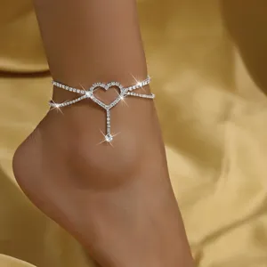 Sparkling rhinestone heart anklet detail, elegant multi-layer crystal foot chain jewelry.