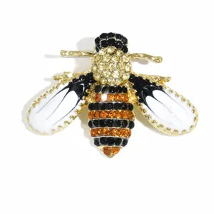 Squisita spilla ape con strass dorata con cristalli neri e arancioni per outfit eleganti.