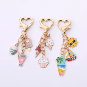 Jolis porte-clés d'été avec breloques cupcake glace voilier, métal doré pour femmes filles.