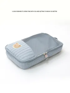 Travel packing cube with cute bear patch, large capacity mesh storage bag for clothes.