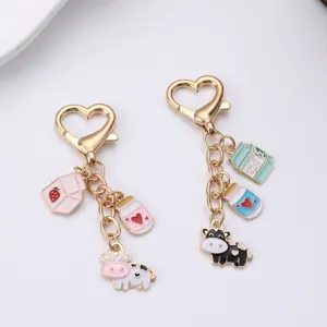 Cute cartoon cow keychain set, heart lobster clasp metal bag pendant with lovely charms.