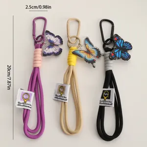 Cordón trenzado de nailon llavero con dije de mariposa y mosquetón para mochilas.