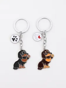 Süßes Dackel Metall Schlüsselanhänger Set mit schönen Hund Pfoten Anhängern für Handtaschen.