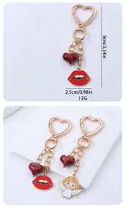 Gold-plated alloy keychain featuring cute heart, red lips and angel charms, 9cm length.