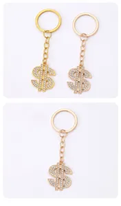 Portachiavi con simbolo del dollaro in strass e metallo dorato lusso per borse e regali da donna.